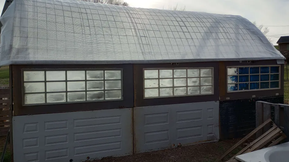 nomadic improvements, greenhouse, low budget, side view, cattle panels, tarp, 