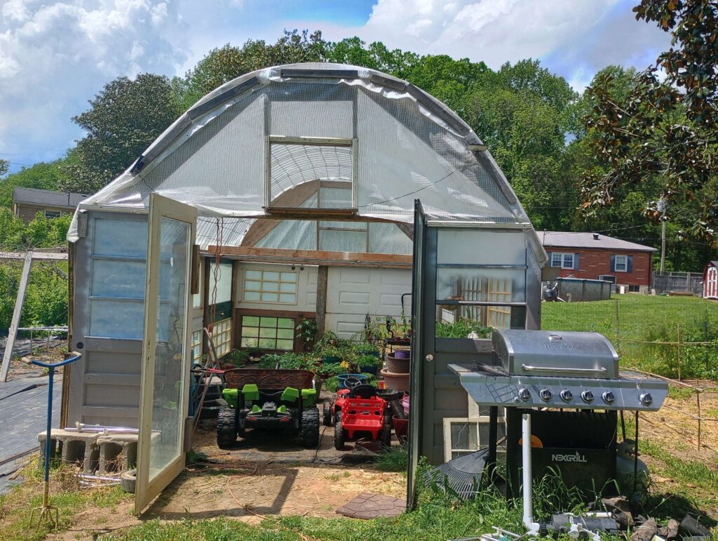nomadic improvements, greenhouse, old doors,